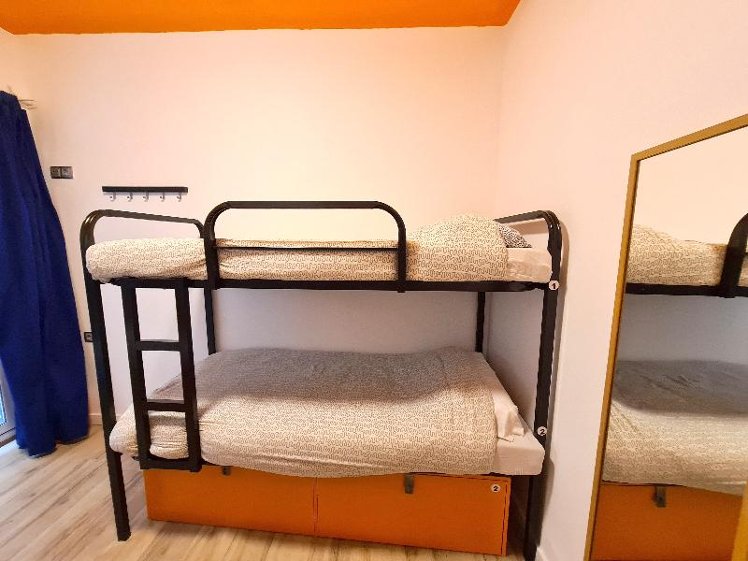 Bed in dormitory CAPACITY 4 Room