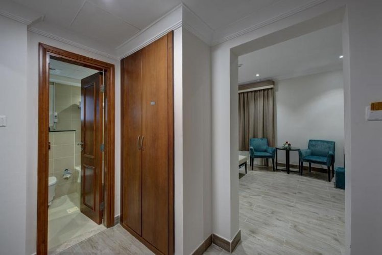 DOUBLE SINGLE USE DELUXE WITH BALCONY Room