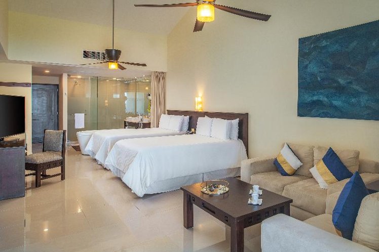 JUNIOR SUITE OCEAN VIEW TWO DOUBLE BEDS Room