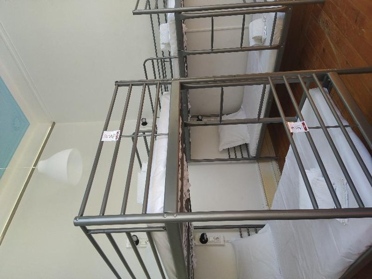 Bed in dormitory BUNK BED WITH SHARED BATHROOM Room