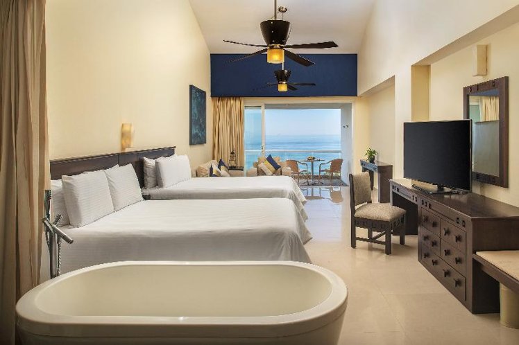JUNIOR SUITE OCEAN VIEW TWO DOUBLE BEDS Room
