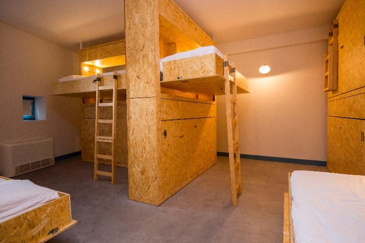 Bed in dormitory TWELVE BEDROOMS Room