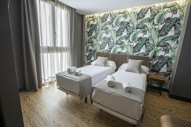 QUADRUPLE CITY VIEW TWO BEDS Room