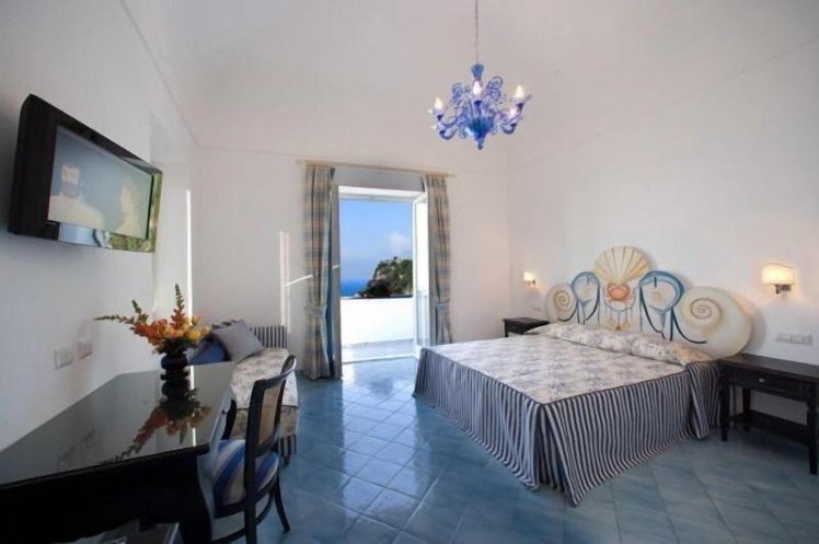 TRIPLE OCEAN VIEW WITH BALCONY Room