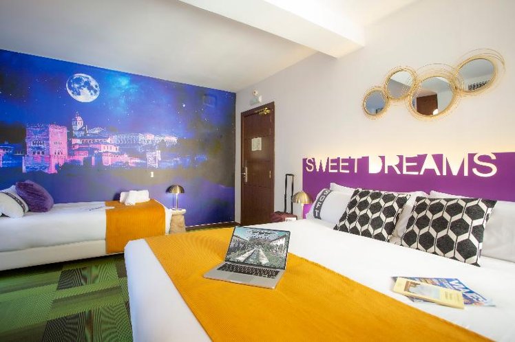 TRIPLE DELUXE WITH BALCONY Room