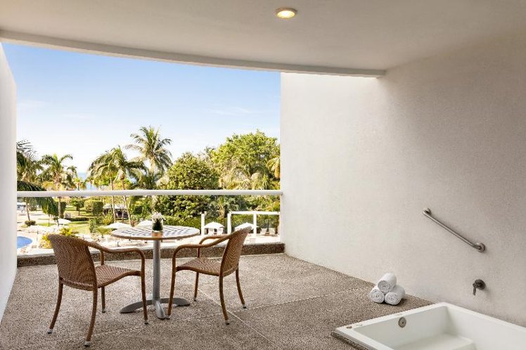 JUNIOR SUITE PARTIAL OCEAN VIEW TWO DOUBLE BEDS Room