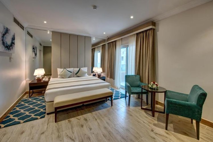 DOUBLE SINGLE USE DELUXE WITH BALCONY Room